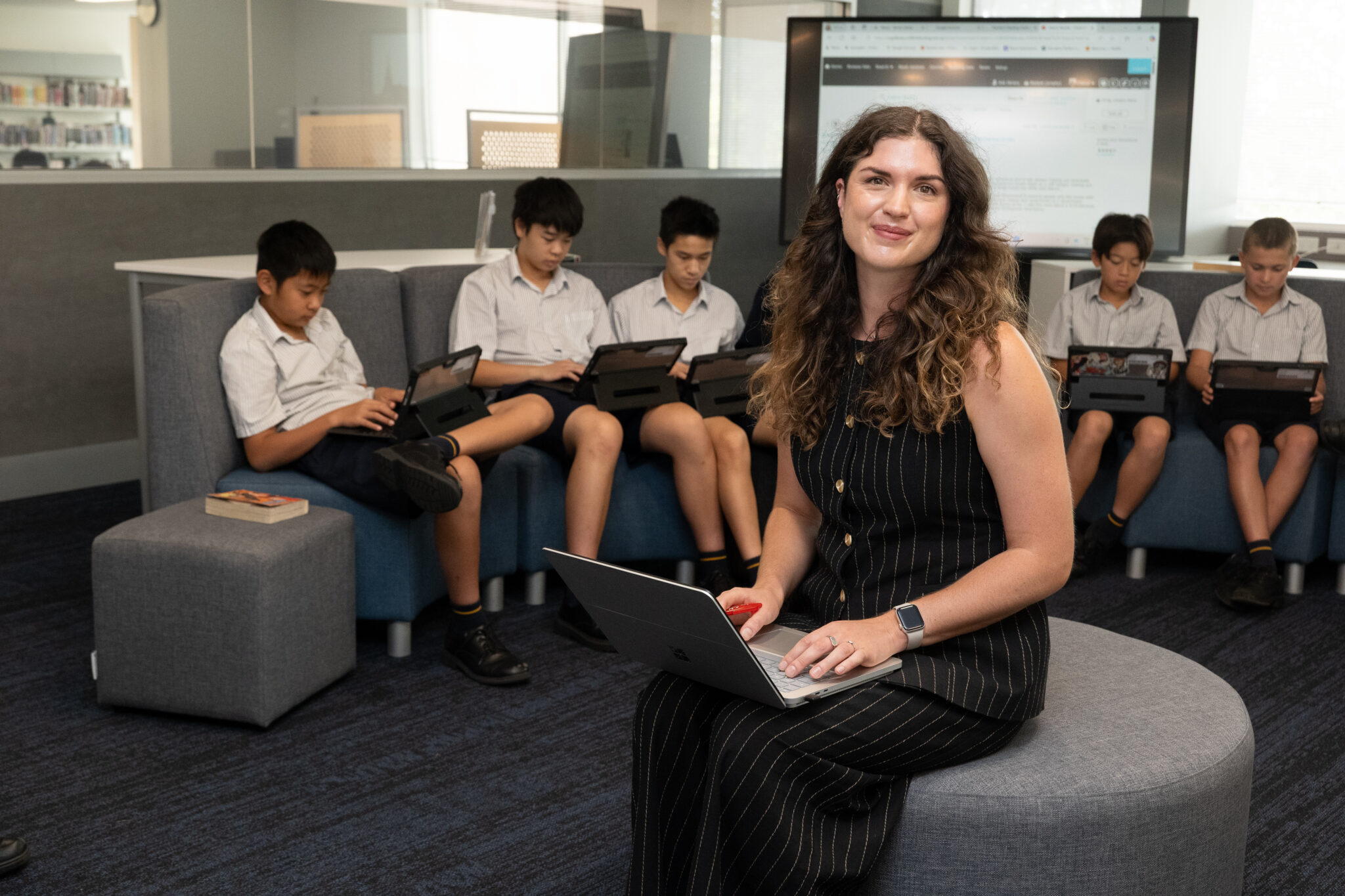 English teacher conducting a class in the ARC and Library.
