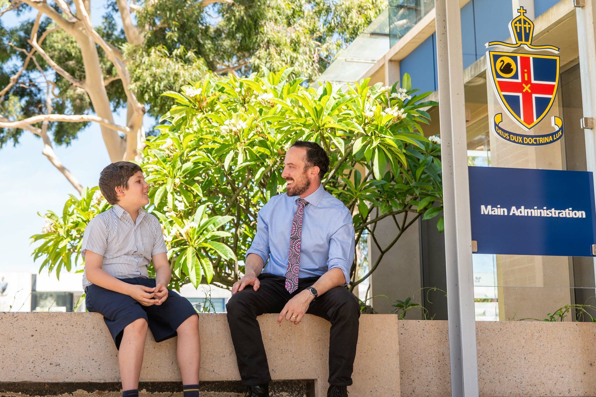 Student and School Chaplain having a discussion