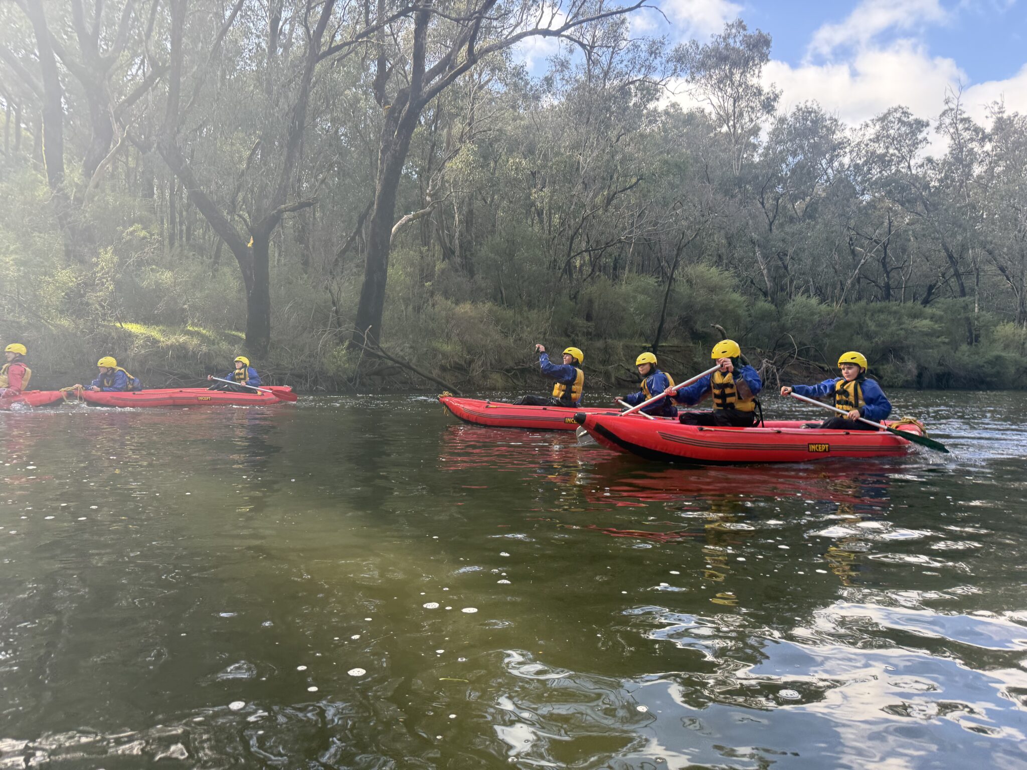 Year 9 students paddling on a river as part of their Outdoor Education Program