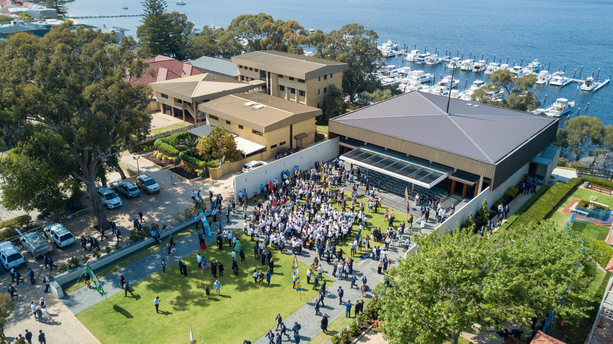 Crowd gathered in front of the School Chapel