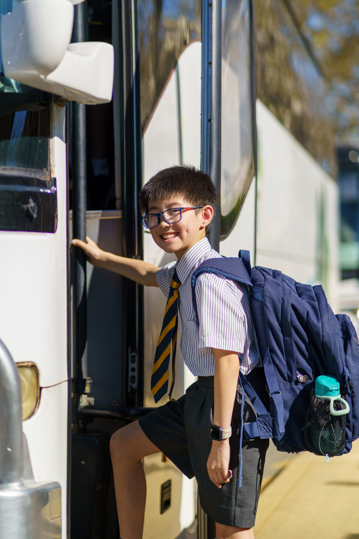 A student about to board the Christ Church/MLC bus service