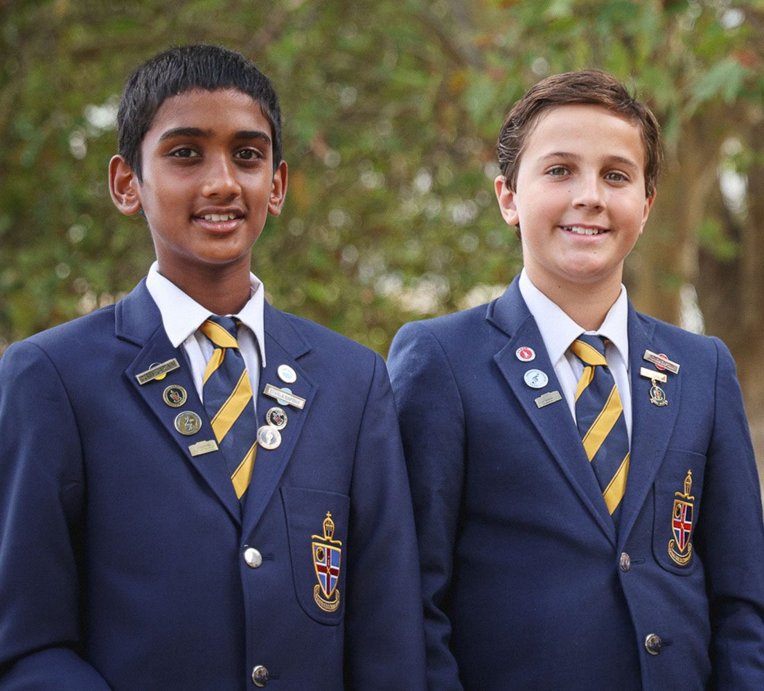 Two CCGS students standing outside Christ Church Claremont