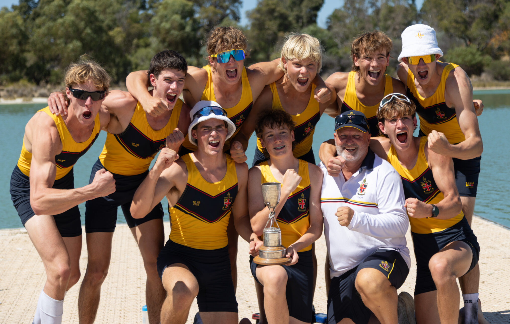 Group photo of the the First VIII Rowers after winning the Head of the River in 2025