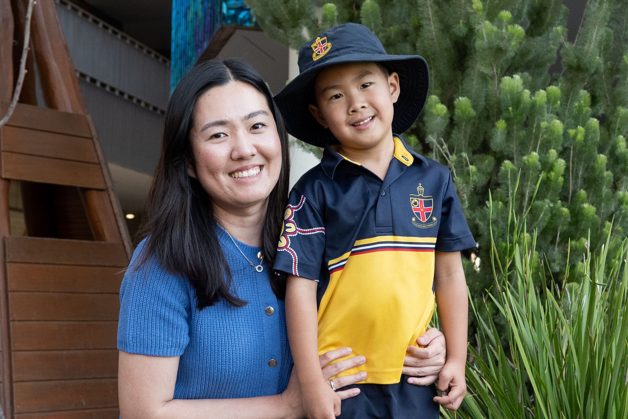 ELC parent and student smiling while in the Nature Playground