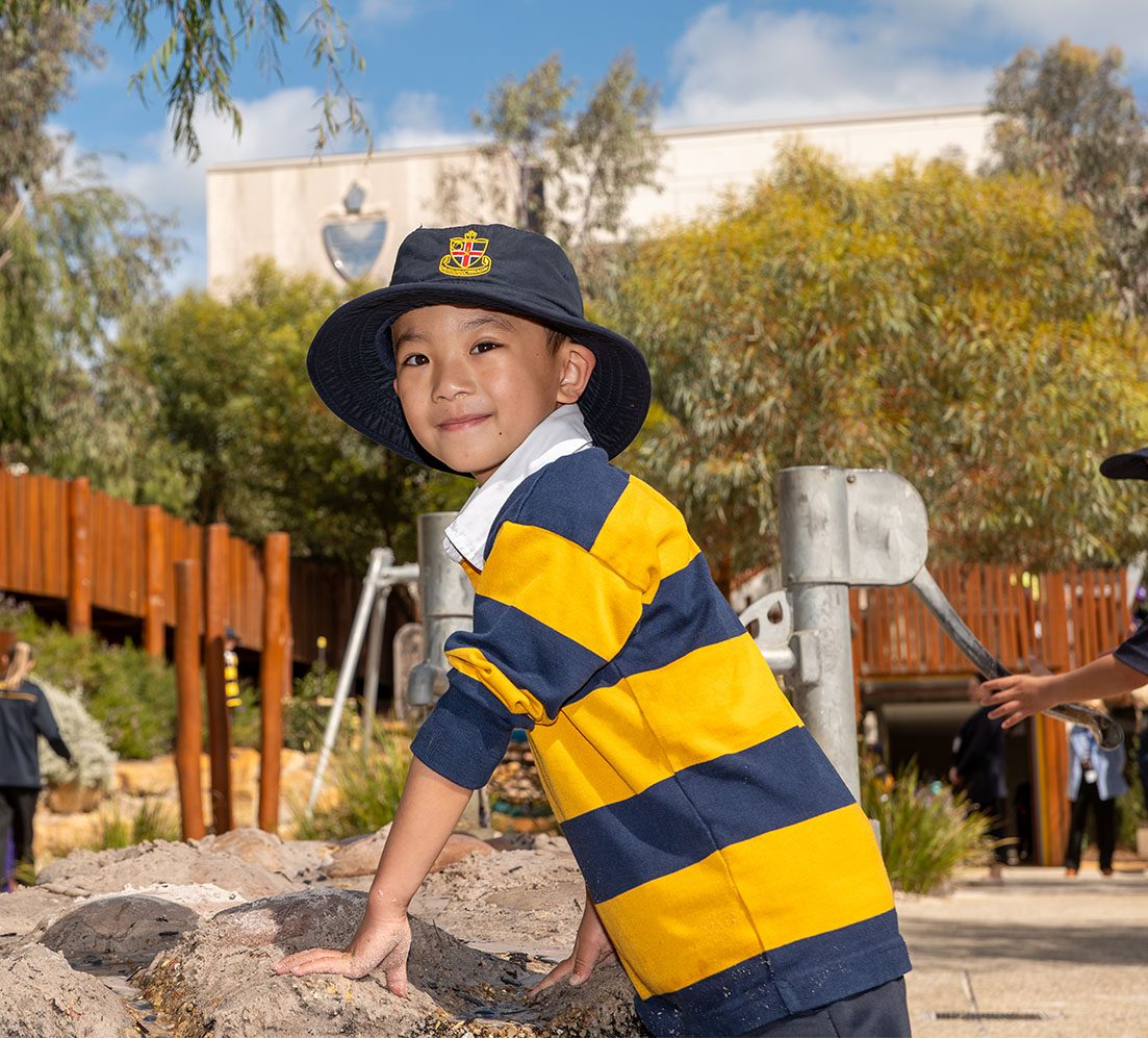 ELC student playing in the Nature Playground