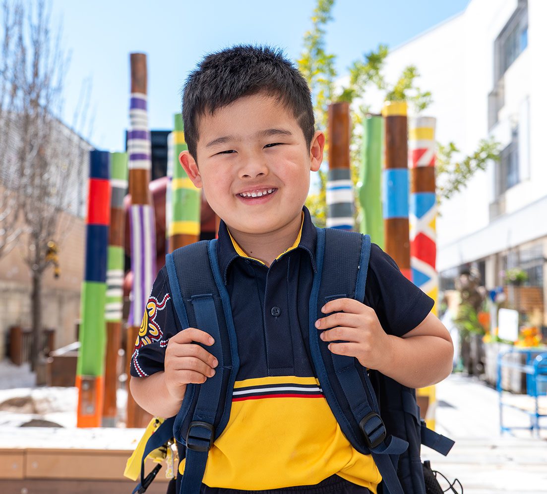 Early Learning Community student with their school bag