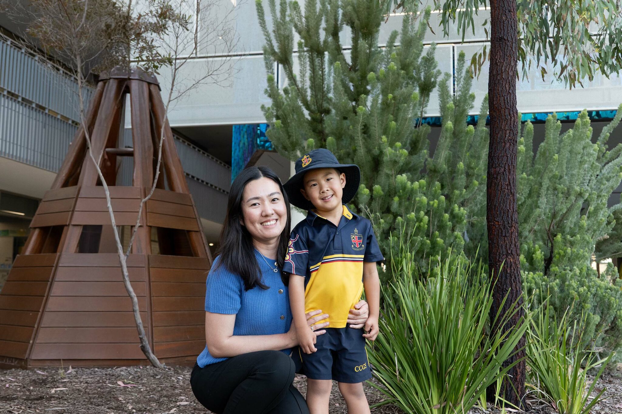 ELC parent and son smiling while in the Nature Playground