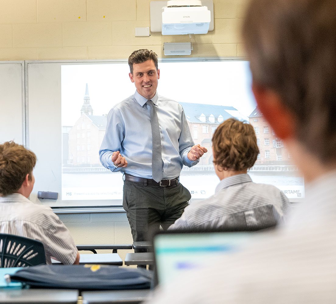 Teacher conducting a lesson in class