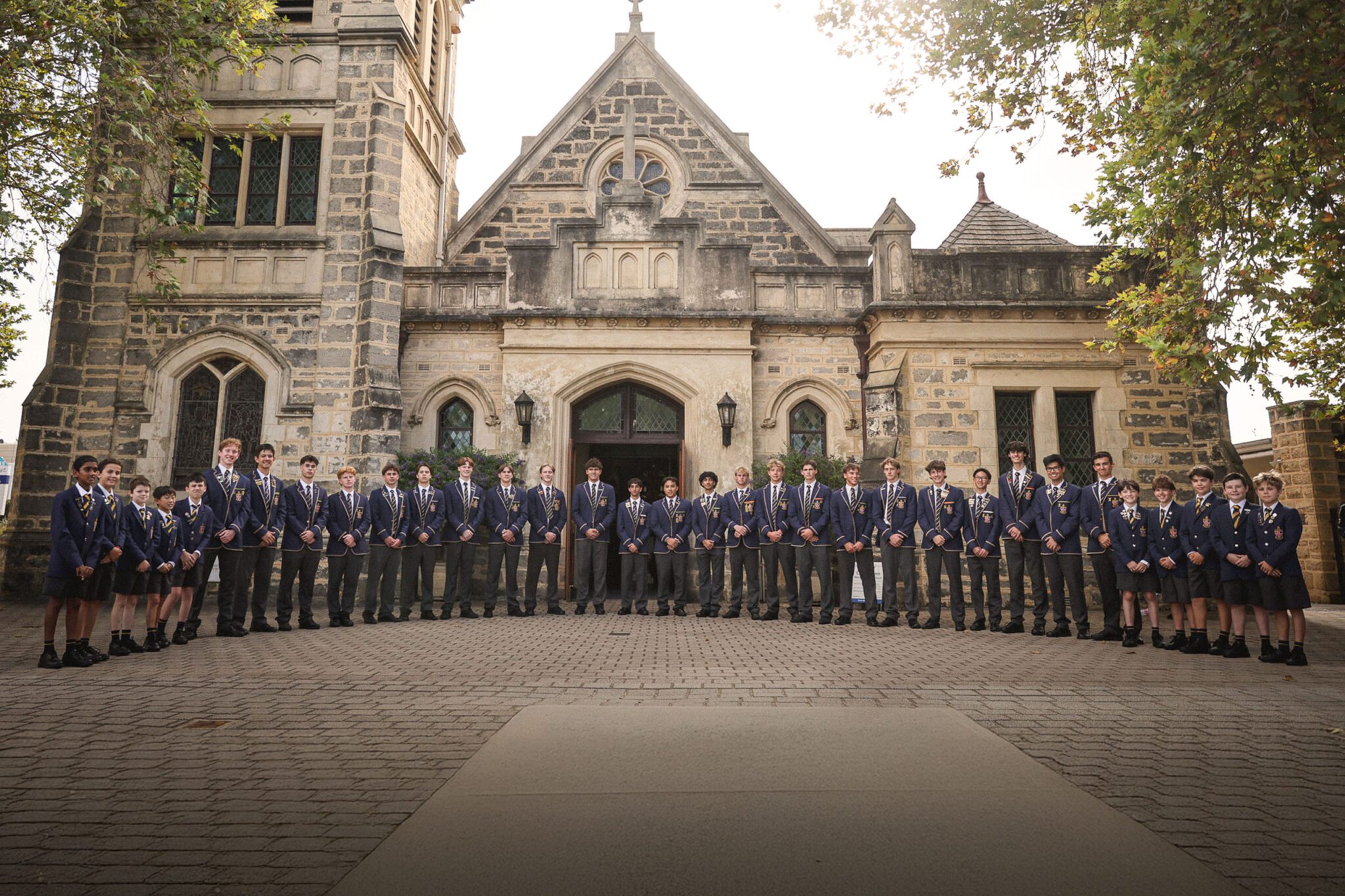 CCGS students standing in front of Christ Church Claremont on Queenslea Drive, Claremont