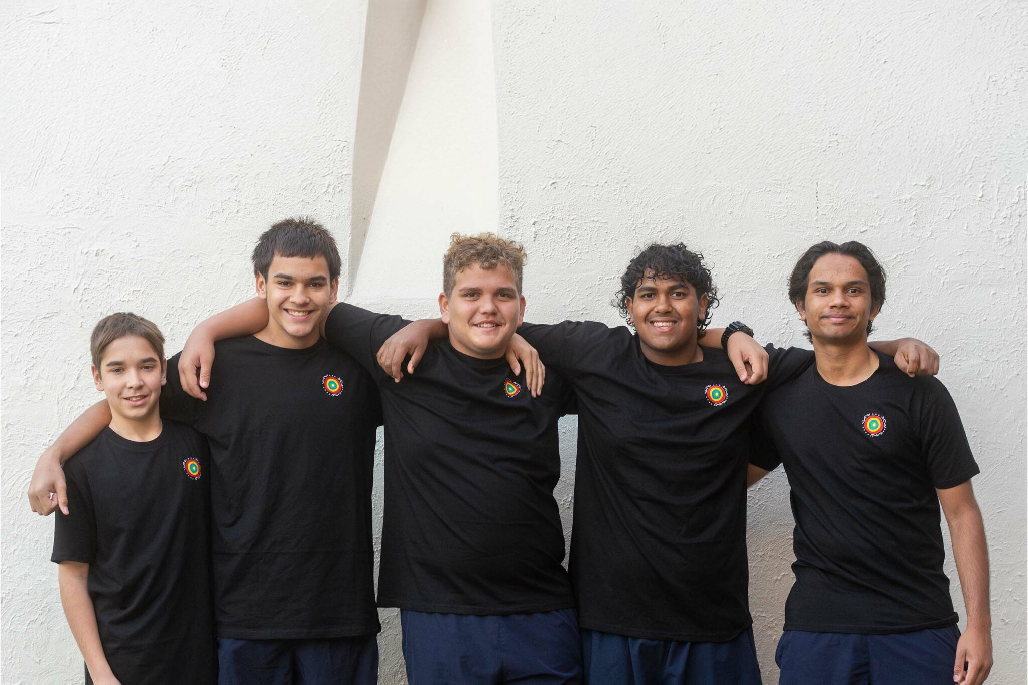 Aboriginal students showcasing their T-shirt designs
